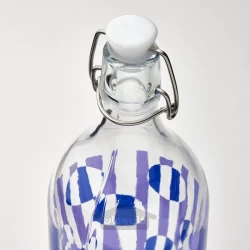 بطری با درپوش شیشه ای شفاف طرح دار/آبی روشن ۱ لیتر ایکیا مدل IKEA KORKEN